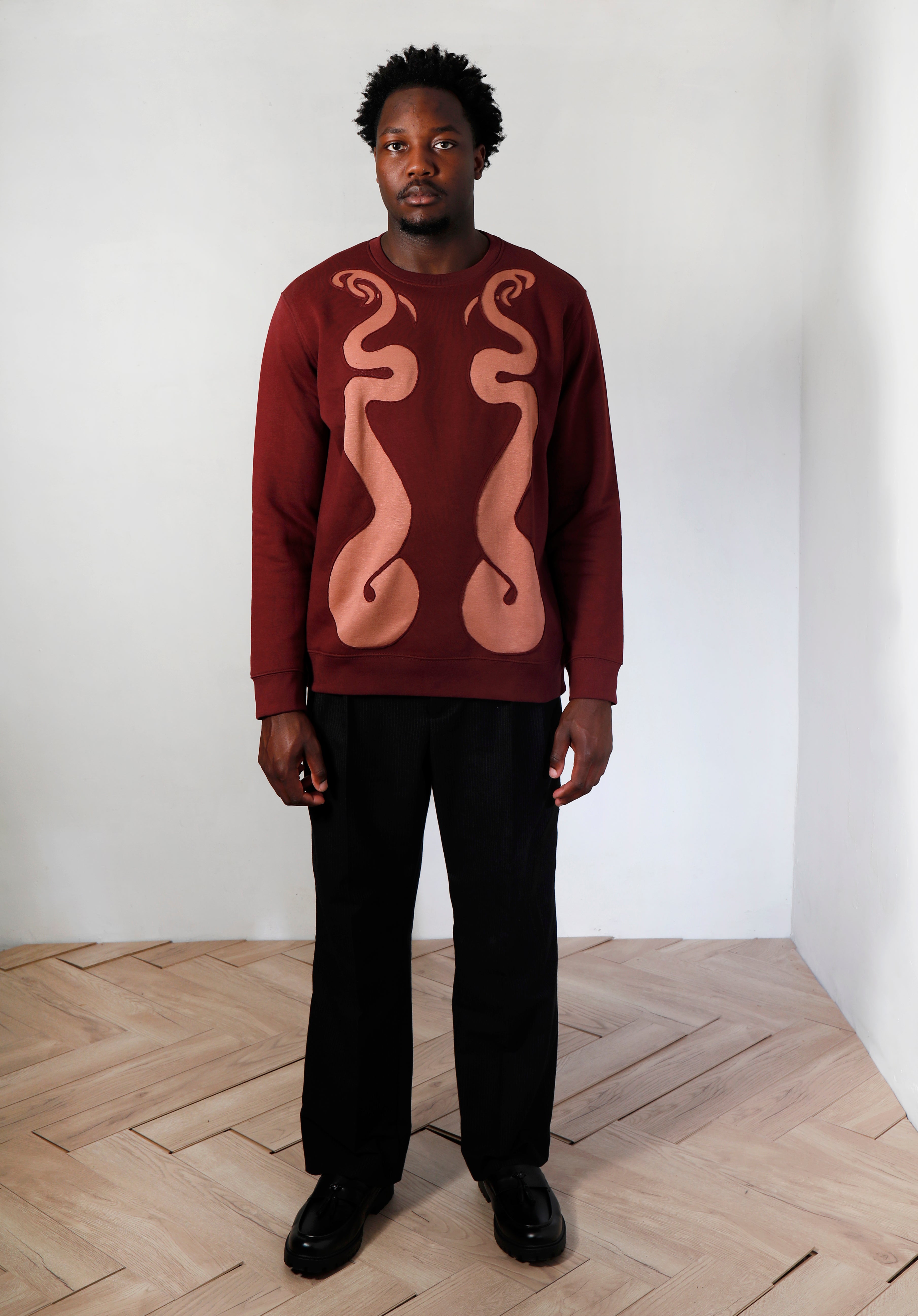 Serpent’s Tail Cutout Sweatshirt
